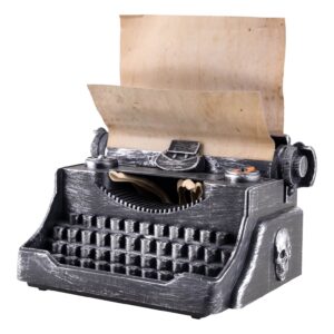 Macchina da scrivere con mano scheletrica animata